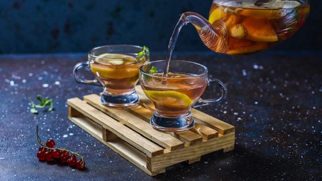 Homemade fruit and berry tea with mint.